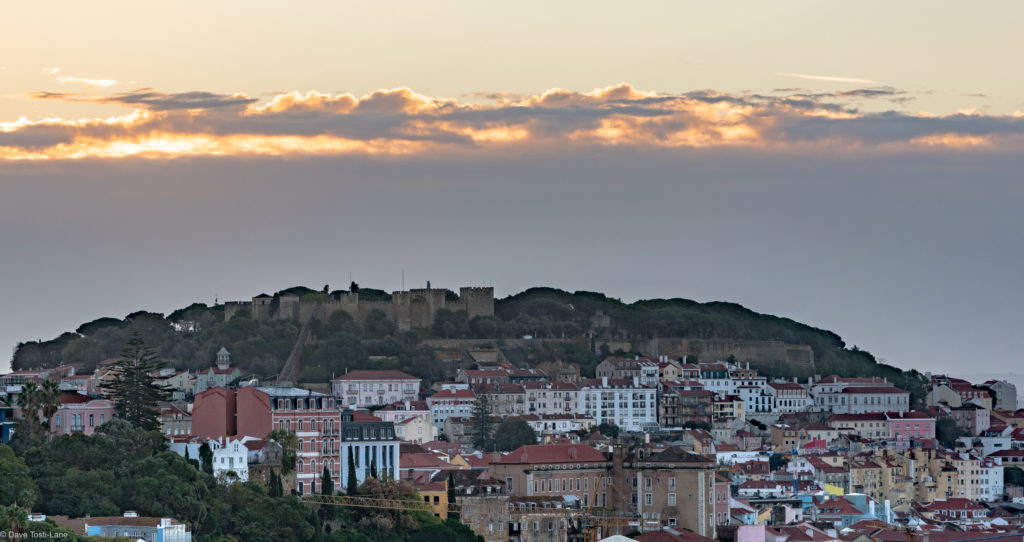 Sun emerging in the morning from the rooftop breakfast terrace at our Hotel in Lisbon